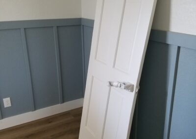 A white door on the wall